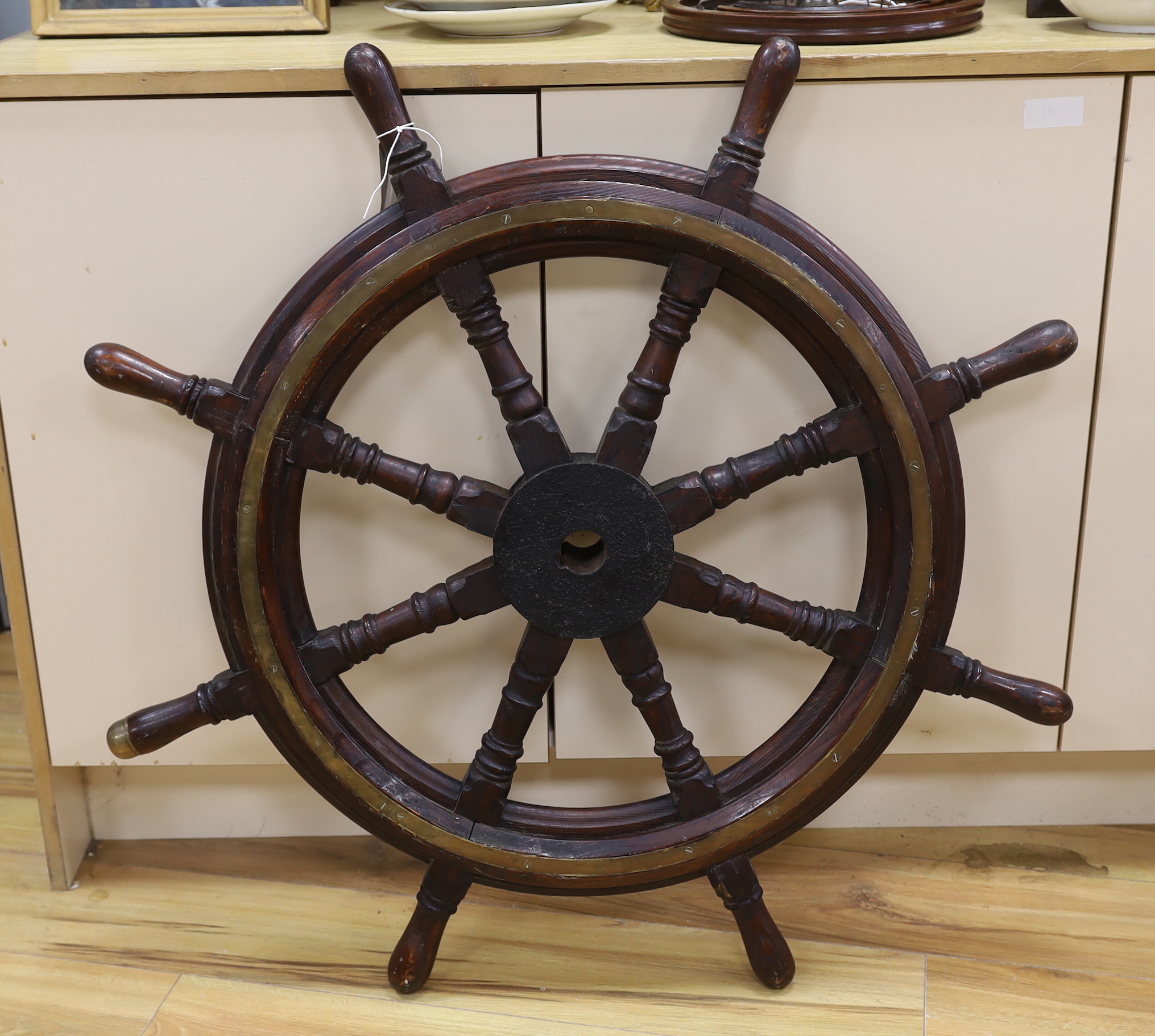A pine and brass mounted ship's wheel, 93cm in diameter
